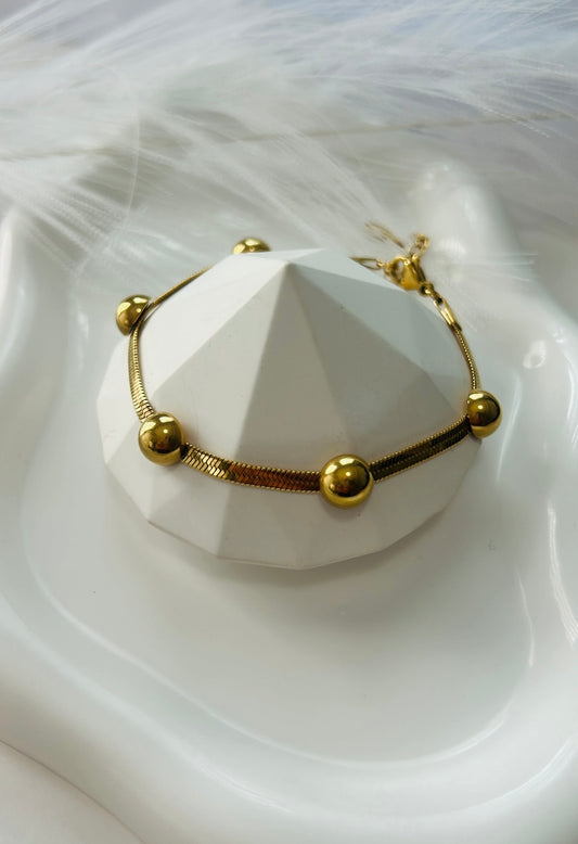 Pulseras con bolitas